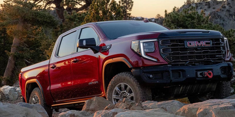 2026 GMC Sierra 1500 trim levels, including Pro, SLT, AT4, Denali, and more, offering various features and capabilities.