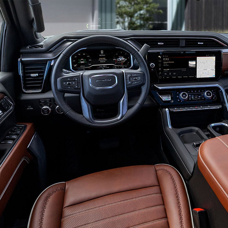 Folsom Buick GMC FOLSOM - 2025 GMC Sierra 2500HD interior showing digital dashboard, premium cognac leather seating, and advanced infotainment system